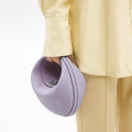 Light purple full-grain leather Luna Bag with silver clasp and adjustable strap