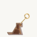 Songmont Puppy Charm: tan and brown leather dog charm with gold clip