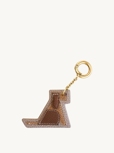 Songmont Puppy Charm: tan and brown leather dog charm with gold clip