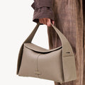 Songmont Drippy Roof Bag in Cobble textured leather, a modern tote with flap closure.