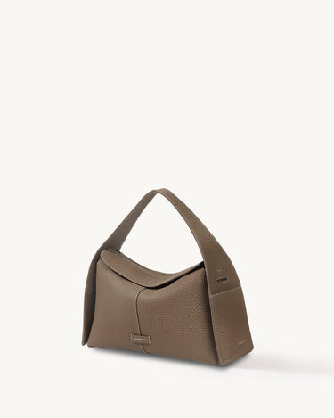 Taupe Drippy Roof Bag in pebbled full-grain leather with a structured silhouette and adjustable strap.