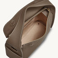 Taupe leather Drippy Roof Bag with an open main compartment and interior pocket.