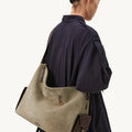 Extra Large Yore Hobo Bag in Dune Suede with contrasting brown leather details.