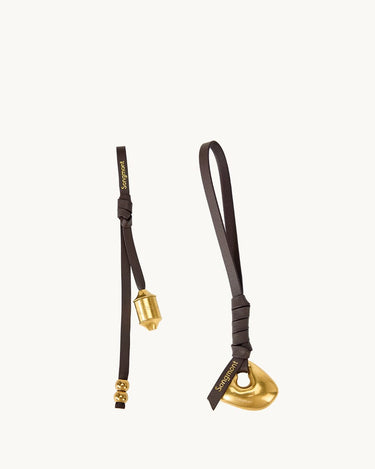 Faith Stone & Prayer Wheel Charm set, Sandal leather with gold metal charms and Songmont logo.