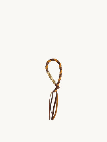 Braided leather cord with gold beads and leather tassels, the Freedom Cord