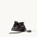 Gather Clutch Set in Ebony, made of full-grain Nappa leather with stainless steel hardware and a two-tone effect.