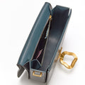 Teal Songmont Reset Tofu Bag interior: calf leather, compartments, gold zipper, patterned lining, vintage Wonton ring.