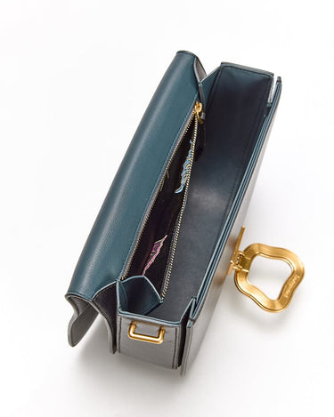 Teal Songmont Reset Tofu Bag interior: calf leather, compartments, gold zipper, patterned lining, vintage Wonton ring.