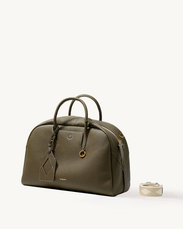 Large Moss Yore Bowling Bag with textured leather and detachable patterned strap.