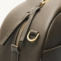 Large Yore Bowling Bag in moss green full-grain leather with gold zipper and white stitching