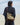 Large Yore Hobo Bag in Dune Suede with leather accents, worn by a person against a desert backdrop.