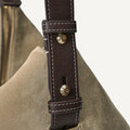 Large Yore Hobo Bag in Dune Suede featuring brown leather strap with white stitching and gold hardware.