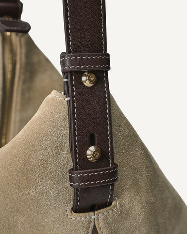 Large Yore Hobo Bag in Dune Suede featuring brown leather strap with white stitching and gold hardware.