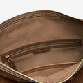 Interior of Large Yore Hobo Bag in Sandal Suede, showing suede lining and zippered pocket with Songmont logo.