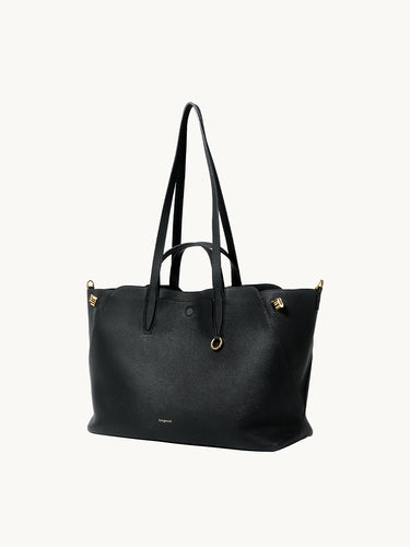 Large Yore Tote Bag in Onyx black full-grain leather with gold hardware. Spacious, shape-shifting design.