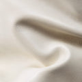 Creamy white full-grain Nappa leather texture, showing supple folds and a subtle pebbled grain.