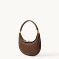 Songmont Luna Bag in Chocolate color, a brown pebbled leather shoulder bag with gold hardware.