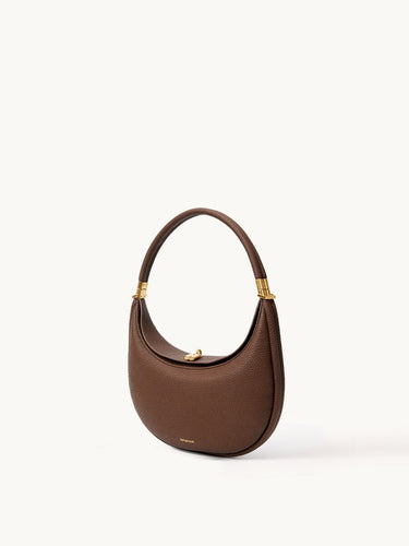 Songmont Luna Bag in Chocolate color, a brown pebbled leather shoulder bag with gold hardware.