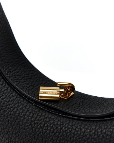 Black pebbled leather Luna Bag with gold Songmont clasp detail