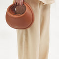 Eco Caramel Luna Bag (vegan leather) with "Songmont" logo.