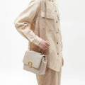 Medium Chocolate Bag in Pearl Grey with gold chain and clasp