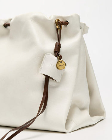 Medium Gather Bag Set in Cloud white leather with dark brown accents and Songmont logo tag.