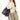 Medium Gather Bag Set in Ebony, worn by a woman in a cream distressed sweater and beige pants.