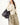 Medium Gather Bag Set in Ebony, worn by a woman in a cream distressed sweater and beige pants.