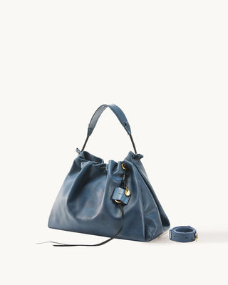 Medium Gather Bag Set in navy blue Nappa leather with gold hardware and adjustable strap.