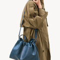 Medium Gather Bag Set in navy blue Nappa leather with adjustable straps and silver hardware.