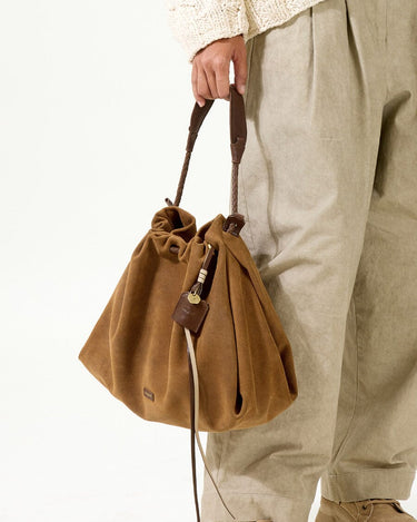 Ochre Suede Medium Gather Bag Set with braided straps and leather charm.