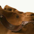 Medium Gather Bag Set in Ochre Suede with textured cow suede leather and full-grain leather strap detail.