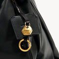 Black pebbled leather Medium Gather Bag Set with gold hardware and Songmont logo detail.