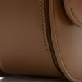 Medium Reset Tofu Bag in Caramel fine calf leather with detailed stitching.