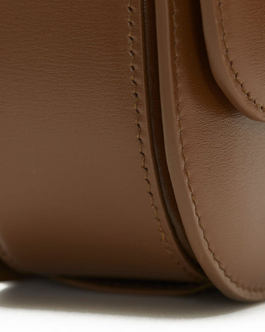Medium Reset Tofu Bag in Caramel fine calf leather with detailed stitching.