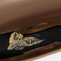 Medium Reset Tofu Bag interior with embroidered butterfly detail in caramel leather