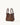 Medium Song Bag in chocolate brown textured full-grain leather with two top handles.