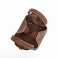 Medium Song Bag in chocolate brown full-grain leather, showing interior with magnetic closure and brass hardware.