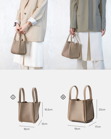 Medium Song Bag: Ivory textured leather bucket bag with twin handles & gold hardware. Size comparison M vs S.