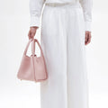 Medium Song Bag in Pink pebbled leather, a stylish and structured carryall.