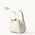 Medium Song Bag in Eco Cloud vegan leather with Global Recycled Standard certification.