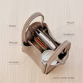 Medium Song Bag in Eco Onyx vegan leather, organized with wallet, iPhone, notebook, pouch, and water bottle.