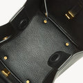 Black vegan leather Medium Song Bag interior with textured lining and gold hardware