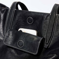 Black leather Medium Yore Duffle Bag with front phone pocket and white stitching