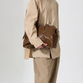 Medium Yore Duffle Bag in Sandal color, made from vegetable-tanned leather with stainless steel hardware.
