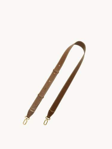 Brown leather shoulder strap for Medium Yore Duffle Bag with gold hardware.