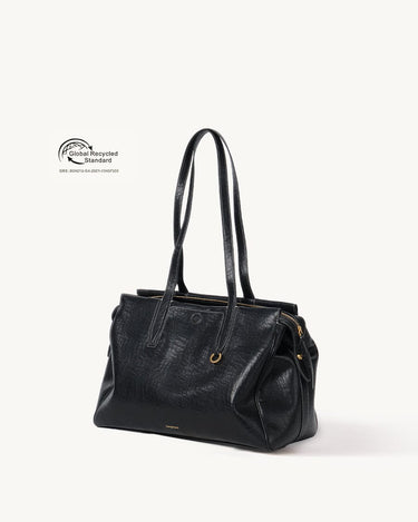 Medium Yore Duffle Bag in Onyx - vegan leather travel bag with GRS certification.