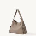 Medium Yore Hobo Bag in Cobble Grain textured leather with silver hardware and adjustable strap.