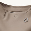 Medium Yore Hobo Bag in Cobble Grain textured leather with silver hardware and zipper.