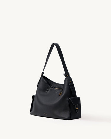 Medium Yore Hobo Bag in Onyx Grain full-grain leather with white stitching and gold hardware.